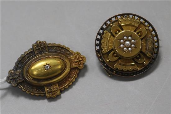 Two late Victorian 15ct gold and gem set brooches, largest 4.5cm.